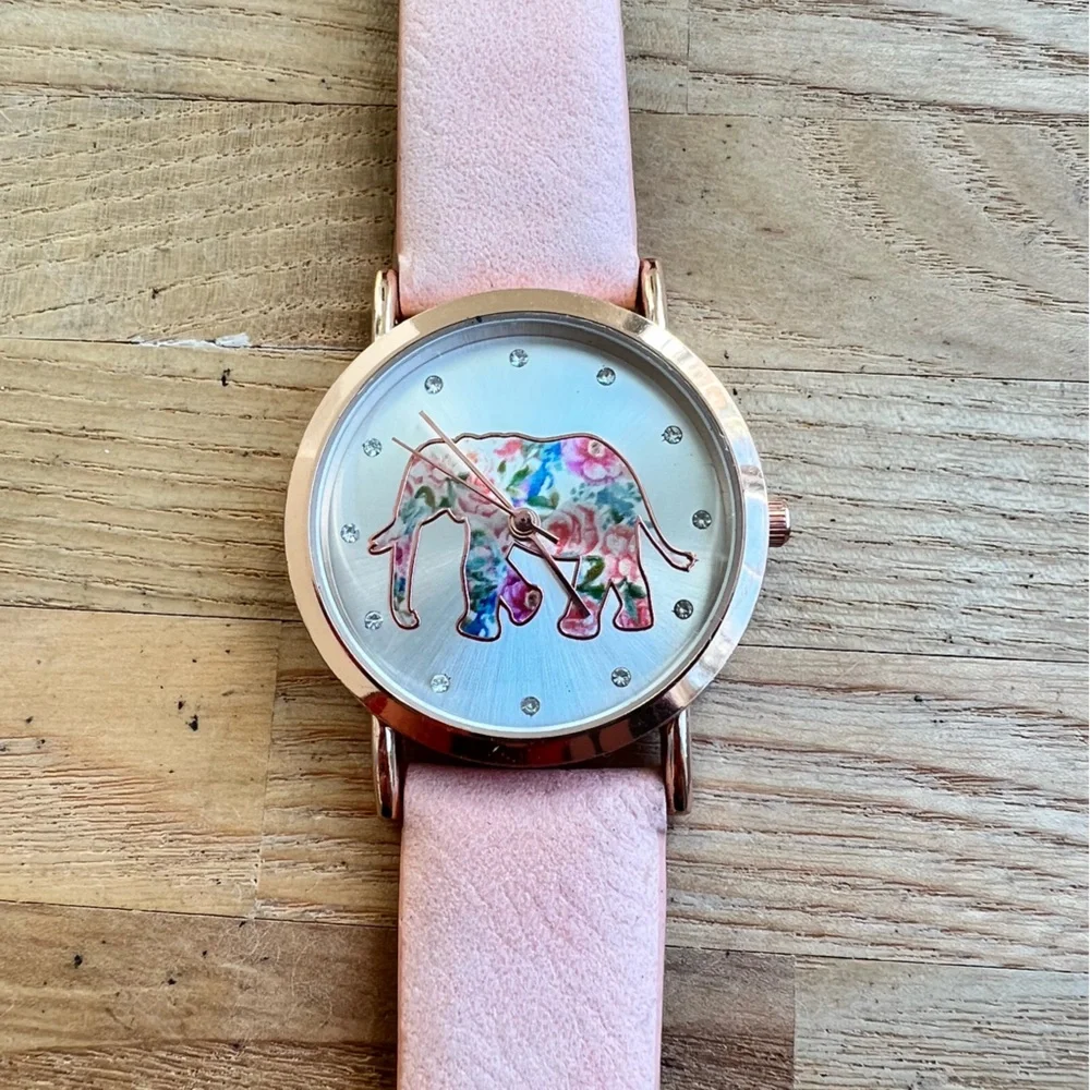 Unbranded ladies pink floral elephant rose gold tone watch NEW BATTERY